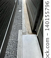 The gap between a detached house and the neighboring house 140155796
