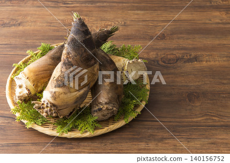 Bamboo shoots served in a colander Bamboo shoots served in a colander 140156752