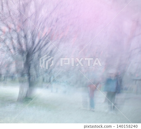 A heartwarming multiple-exposure photograph taken in a park with cherry blossoms in bloom. A heartwarming multiple-exposure photograph taken in a park with cherry blossoms in bloom. 140158240