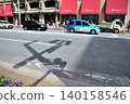 The shadows of streetlights reflected on the road in front of a long-established department store in Nihonbashi. 140158546