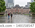 Two foreign men walking down Gyoko-dori Street on a rainy day. 140158547