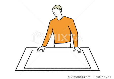 A man with large documents spread out on his desk. A man with large documents spread out on his desk. 140158755