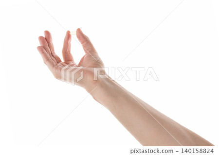Male hand hold transparent pill isolated on white Male hand hold transparent pill isolated on white 140158824