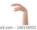 Female hand reaching something isolated on white 140158932