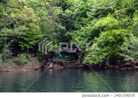 Exploring Matka Canyon in North Macedonia with lush greenery and a river view Exploring Matka Canyon in North Macedonia with lush greenery and a river view 140159059