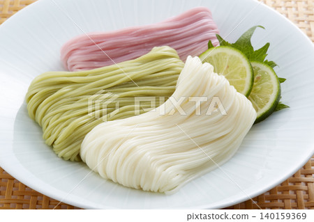 Cold and delicious-looking somen noodles - a representative summer noodle dish of Japan. Cold and delicious-looking somen noodles - a representative summer noodle dish of Japan. 140159369