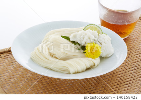 Cold and delicious somen noodles - a representative summer noodle dish of Japan. Cold and delicious somen noodles - a representative summer noodle dish of Japan. 140159422