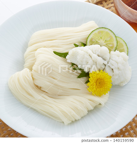 Cold and delicious somen noodles - a representative summer noodle dish of Japan. Cold and delicious somen noodles - a representative summer noodle dish of Japan. 140159590