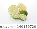 Citrus fruits placed on a white background: lime, lemon, and sudachi. 140159720