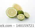 Citrus fruits placed on a white background: lime, lemon, and sudachi. 140159721