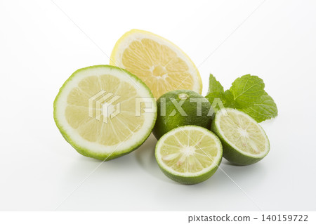 Citrus fruits placed on a white background: lime, lemon, and sudachi. 140159722