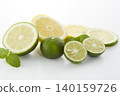 Citrus fruits placed on a white background: lime, lemon, and sudachi. 140159726