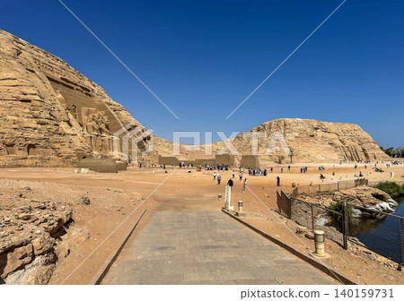 Abu Simbel, a cliff on the west bank of the Nile, in which two ancient Egyptian temples of Ramesses II are carved, Egypt. Abu Simbel, a cliff on the west bank of the Nile, in which two ancient Egyptian temples of Ramesses II are carved, Egypt. 140159731