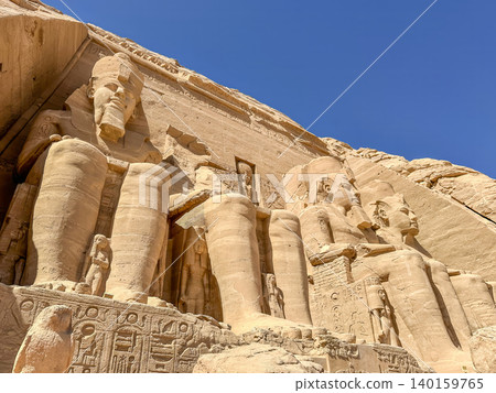 Abu Simbel, a cliff on the west bank of the Nile, in which two ancient Egyptian temples of Ramesses II are carved, Egypt. Abu Simbel, a cliff on the west bank of the Nile, in which two ancient Egyptian temples of Ramesses II are carved, Egypt. 140159765