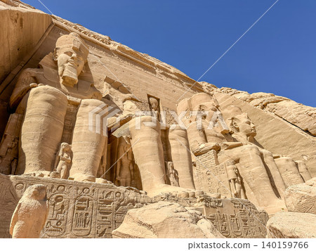 Abu Simbel, a cliff on the west bank of the Nile, in which two ancient Egyptian temples of Ramesses II are carved, Egypt. Abu Simbel, a cliff on the west bank of the Nile, in which two ancient Egyptian temples of Ramesses II are carved, Egypt. 140159766