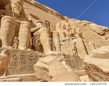 Abu Simbel, a cliff on the west bank of the Nile, in which two ancient Egyptian temples of Ramesses II are carved, Egypt. Abu Simbel, a cliff on the west bank of the Nile, in which two ancient Egyptian temples of Ramesses II are carved, Egypt. 140159770