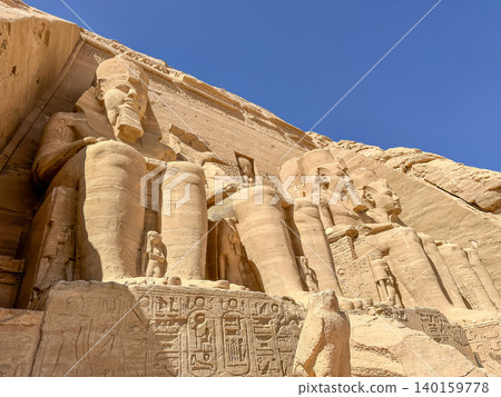 Abu Simbel, a cliff on the west bank of the Nile, in which two ancient Egyptian temples of Ramesses II are carved, Egypt. Abu Simbel, a cliff on the west bank of the Nile, in which two ancient Egyptian temples of Ramesses II are carved, Egypt. 140159778
