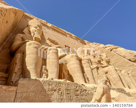 Abu Simbel, a cliff on the west bank of the Nile, in which two ancient Egyptian temples of Ramesses II are carved, Egypt. Abu Simbel, a cliff on the west bank of the Nile, in which two ancient Egyptian temples of Ramesses II are carved, Egypt. 140159784