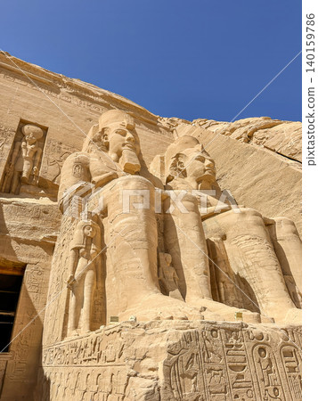 Abu Simbel, a cliff on the west bank of the Nile, in which two ancient Egyptian temples of Ramesses II are carved, Egypt. Abu Simbel, a cliff on the west bank of the Nile, in which two ancient Egyptian temples of Ramesses II are carved, Egypt. 140159786
