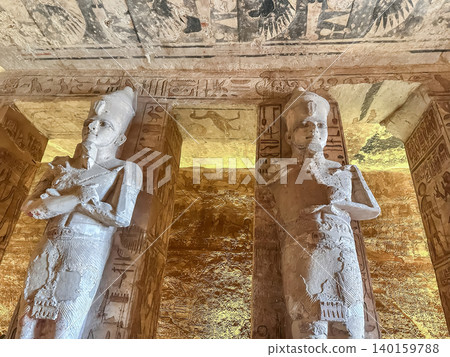 Abu Simbel, a cliff on the west bank of the Nile, in which two ancient Egyptian temples of Ramesses II are carved, Egypt. Abu Simbel, a cliff on the west bank of the Nile, in which two ancient Egyptian temples of Ramesses II are carved, Egypt. 140159788