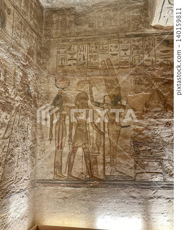 Interior decoration and statues in the Abu Simbel temple, a landmark in Nubia built by King Ramesses II, Egypt. Interior decoration and statues in the Abu Simbel temple, a landmark in Nubia built by King Ramesses II, Egypt. 140159811