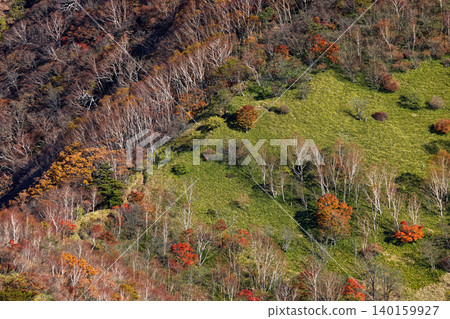 Autumn foliage on the mountain slopes as seen from Mt. Akagi and Mt. Komagatake 140159927
