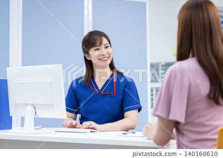 Medical Female doctor examining 140160610