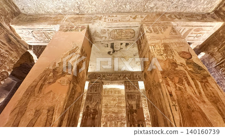 Interior decoration and statues in the Abu Simbel temple, a landmark in Nubia built by King Ramesses II, Egypt. Interior decoration and statues in the Abu Simbel temple, a landmark in Nubia built by King Ramesses II, Egypt. 140160739