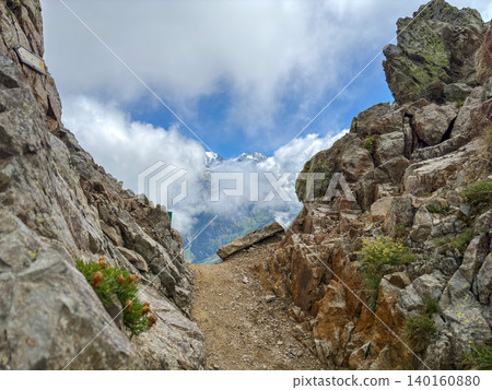 Rocky mountain pass with view of Mont Blanc, France Rocky mountain pass with view of Mont Blanc, France 140160880