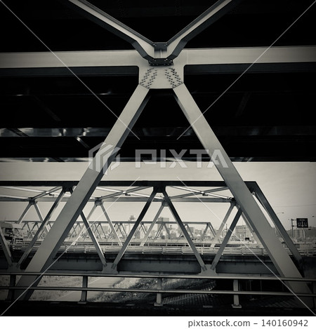 Bridge girders where the truss structure is easily visible Bridge girders where the truss structure is easily visible 140160942