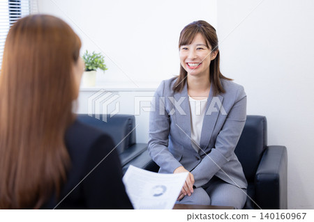 A woman in business, sales, or negotiation. A woman in business, sales, or negotiation. 140160967