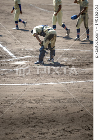 Scene from the end of a high school baseball game. Scene from the end of a high school baseball game. 140162653