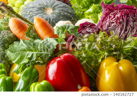 A table filled with fresh vegetables and agricultural products, a rich selection of healthy ingredients. A table filled with fresh vegetables and agricultural products, a rich selection of healthy ingredients. 140162727