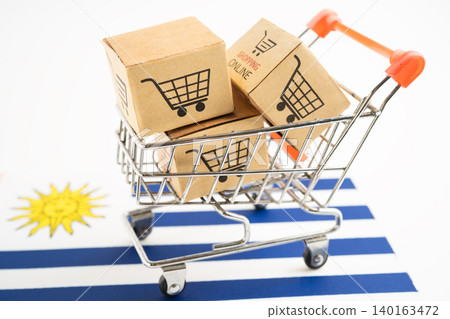 Box with shopping online cart logo and Uruguay flag. Box with shopping online cart logo and Uruguay flag. 140163472