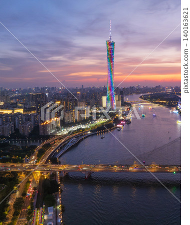 Aerial View of Guangzhou Skyline at Dusk with Colorful Canton Tower 140163621
