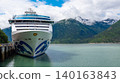 Skagway, Alaska, USA - July 23, 2019: Cruise ship vacation tour. Alaska harbor with cruise liner ship. Travel vacation tour. Travel destination. Island Princess of Princess cruises. Copy space 140163843