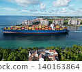 Miami, Florida, USA - June 07, 2024: Cargo ship barge in Miami Biscayne bay. Miami marina bay view. Cargo ship in Florida. Miami beach with barge in Biscayne bay 140163864