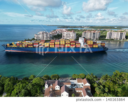 Miami, Florida, USA - June 07, 2024: Cargo ship barge in Miami Biscayne bay. Miami marina bay view. Cargo ship in Florida. Miami beach with barge in Biscayne bay Miami, Florida, USA - June 07, 2024: Cargo ship barge in Miami Biscayne bay. Miami marina bay view. Cargo ship in Florida. Miami beach with barge in Biscayne bay 140163864