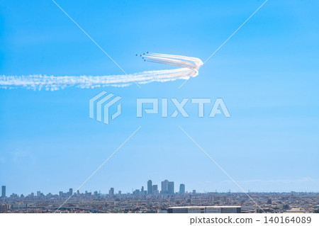 The Blue Impulse aerobatic team flies over Komaki City at the Komaki Air Base Air Festival (Komaki City, Aichi Prefecture). The Blue Impulse aerobatic team flies over Komaki City at the Komaki Air Base Air Festival (Komaki City, Aichi Prefecture). 140164089