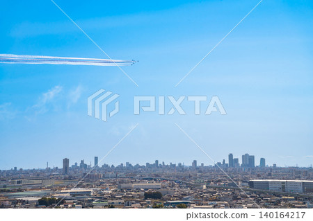The Blue Impulse aerobatic team flies over Komaki City at the Komaki Air Base Air Festival (Komaki City, Aichi Prefecture). The Blue Impulse aerobatic team flies over Komaki City at the Komaki Air Base Air Festival (Komaki City, Aichi Prefecture). 140164217