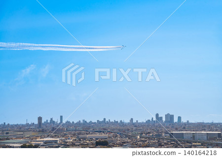 The Blue Impulse aerobatic team flies over Komaki City at the Komaki Air Base Air Festival (Komaki City, Aichi Prefecture). The Blue Impulse aerobatic team flies over Komaki City at the Komaki Air Base Air Festival (Komaki City, Aichi Prefecture). 140164218