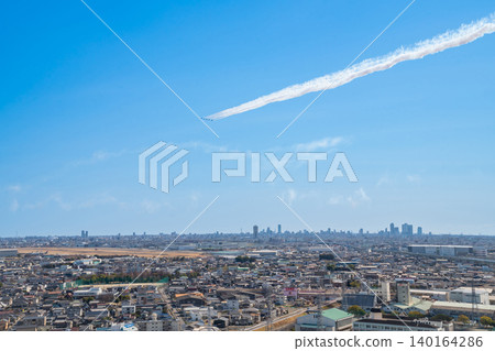 The Blue Impulse aerobatic team flies over Komaki City at the Komaki Air Base Air Festival (Komaki City, Aichi Prefecture). The Blue Impulse aerobatic team flies over Komaki City at the Komaki Air Base Air Festival (Komaki City, Aichi Prefecture). 140164286