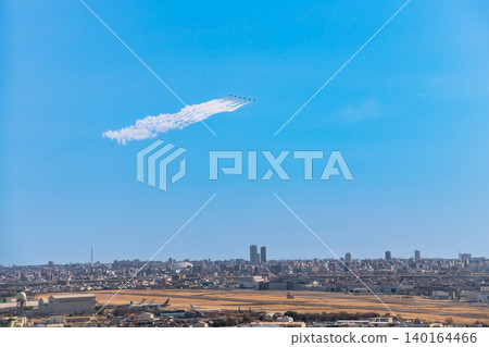 The Blue Impulse aerobatic team flies over Komaki City at the Komaki Air Base Air Festival (Komaki City, Aichi Prefecture). The Blue Impulse aerobatic team flies over Komaki City at the Komaki Air Base Air Festival (Komaki City, Aichi Prefecture). 140164466