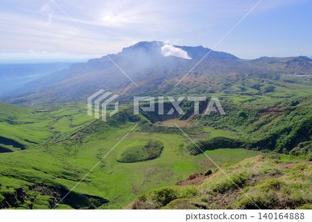 Mount Aso in Kumamoto Prefecture, a view of the Komiike crater group and Mount Takadake and Mount Nakadake from Mount Kijimadake. Mount Aso in Kumamoto Prefecture, a view of the Komiike crater group and Mount Takadake and Mount Nakadake from Mount Kijimadake. 140164888