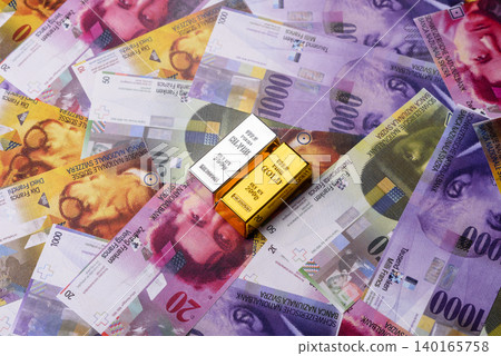 Gold and silver bullion or ingots as metals for bank storage, investments. Gold and silver bars Gold and silver bullion or ingots as metals for bank storage, investments. Gold and silver bars 140165758