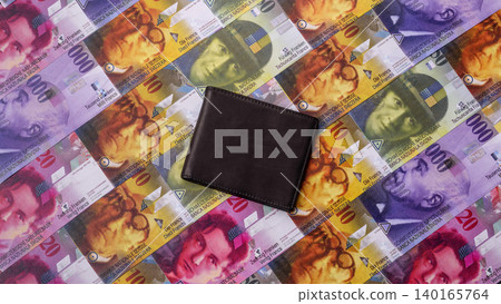 Switzerland, Swiss franc paper money and coins, financing and commodity exchange. Swiss currency Switzerland, Swiss franc paper money and coins, financing and commodity exchange. Swiss currency 140165764