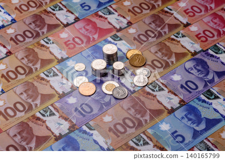 Money, currency of Canada, dollar banknotes of various denominations. Canadian money Money, currency of Canada, dollar banknotes of various denominations. Canadian money 140165799