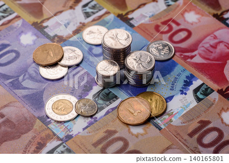 Money, currency of Canada, dollar banknotes of various denominations. Canadian money Money, currency of Canada, dollar banknotes of various denominations. Canadian money 140165801