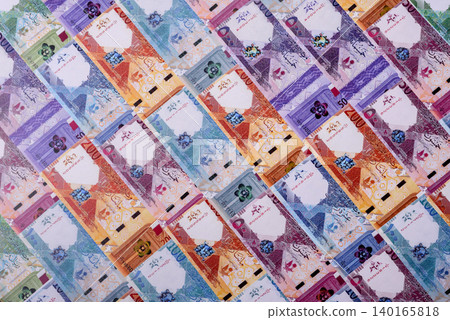 Qatar paper money, the Qatari riyal as a tool for financial transactions and trade. Qatari money Qatar paper money, the Qatari riyal as a tool for financial transactions and trade. Qatari money 140165818