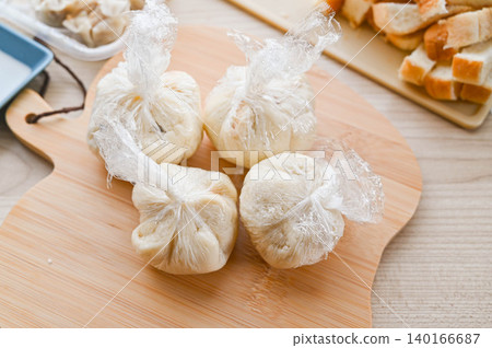 Microwave shumai wrapped in sliced bread. Microwave shumai wrapped in sliced bread. 140166687
